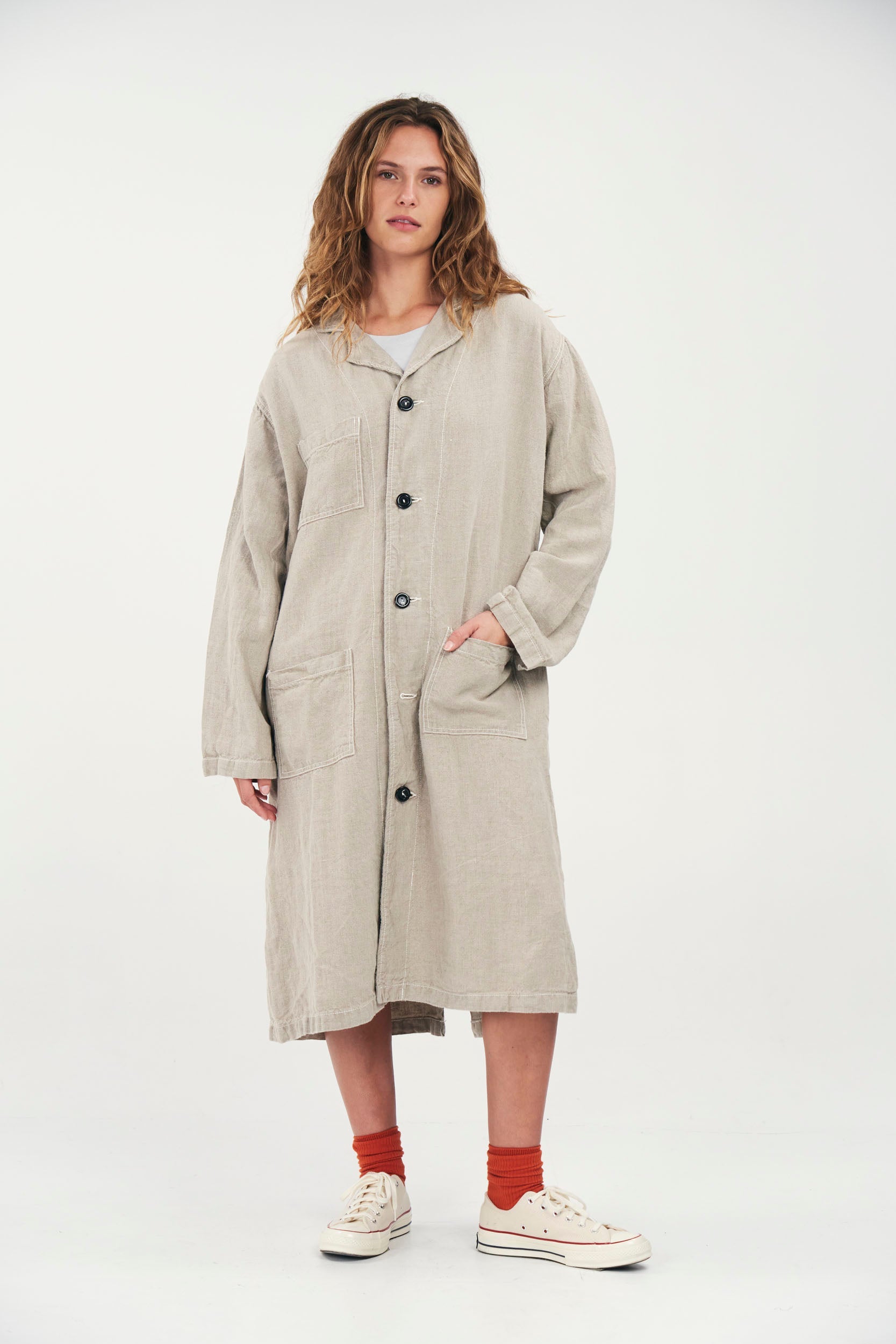 You The Brave - Linen Lab Coat - Reviving forgotten textiles into timeless masterpieces. Our ethical practices and up-cycling philosophy drive positive change. Based in LA, we excel in designing, sourcing, and manufacturing domestic goods, crafting luxury utilitarian collections. Express your style sustainably with authentic, American-made fashion and support our commitment to locally-produced goods.