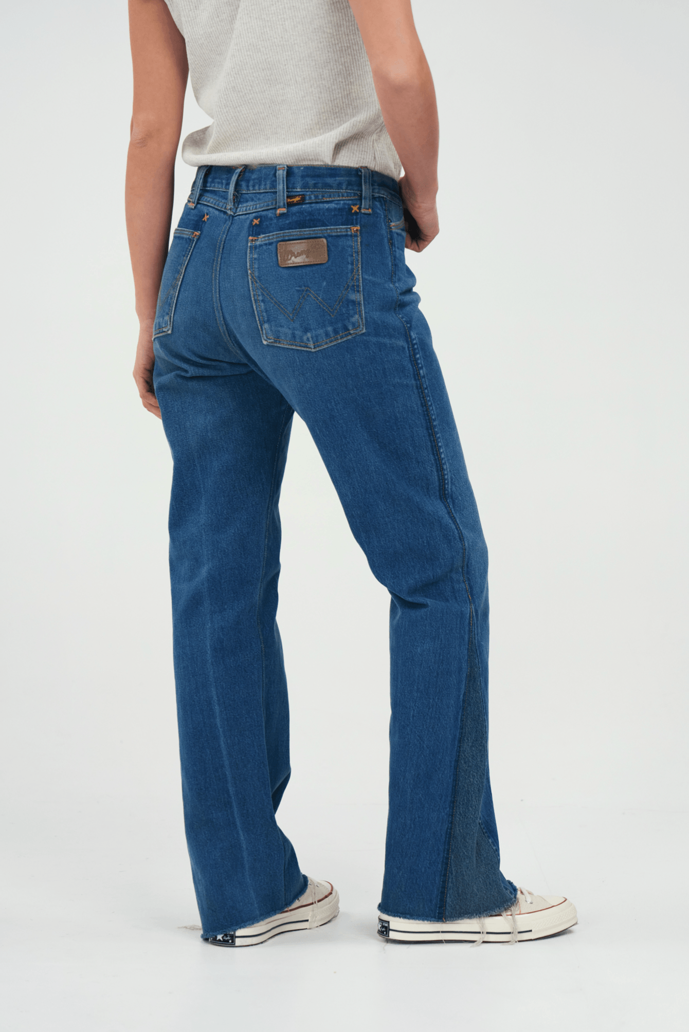 Wrangled Denim Bell Bottoms - youthebrave - Reviving forgotten textiles into timeless masterpieces. Our ethical practices and up-cycling philosophy drive positive change. Based in LA, we excel in designing, sourcing, and manufacturing domestic goods, crafting luxury utilitarian collections. Express your style sustainably with authentic, American-made fashion and support our commitment to locally-produced goods.